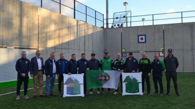 Rockland GAA club members pictured with Uachtarán Chumann Lúthchleas Gael, Larry McCarthy, at the official opening of their newly constructed ball wall. 