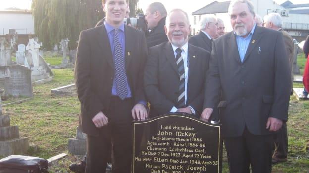 Pictured at the gravestone of John McKay are, left to right, Donal McAnallen, historian, Philip Byrne, great-grandnephew of John McKay, and Kieran McConville. 