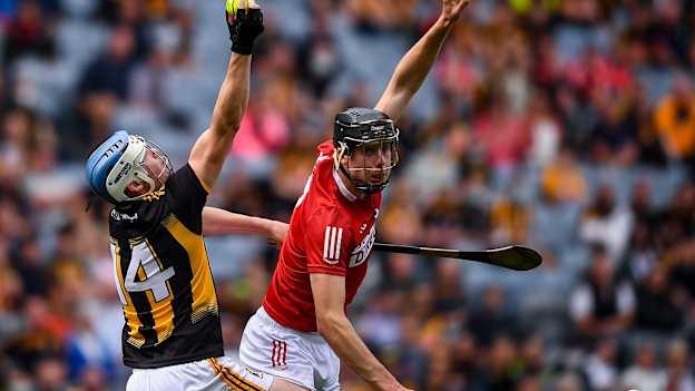 TJ Reid of Kilkenny catches a high ball ahead of Robert Downey of Cork during the GAA Hurling All-Ireland Senior Championship semi-final match between Kilkenny and Cork at Croke Park in Dublin. Photo by David Fitzgerald/Sportsfile.