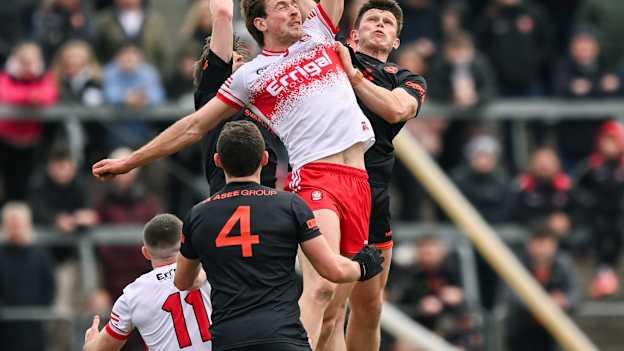 Anton Tohill of Derry in action against Callum O'Neill of Armagh during the Allianz Football League Division 1 match between Armagh and Derry at BOX-IT Athletic Grounds in Armagh. Photo by Ramsey Cardy/Sportsfile.