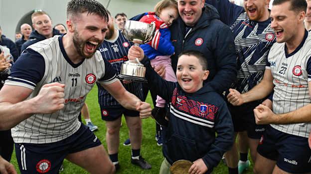 Daithi Hartnett, aged 7, son of New York manager Richie Hartnett celebrates with the cup after the 2024 Connacht Hurling League Cup final match between New York and Mayo at University of Galway Connacht GAA AirDome in Bekan, Mayo. Photo by Tyler Miller/Sportsfile