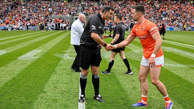 Referee Sean Hurson and Armagh captain Aidan Forker before the 2024 All-Ireland SFC final. Photo by Ray McManus/Sportsfile