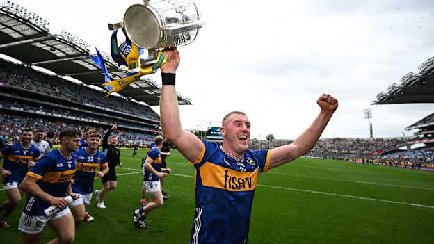 Eoghan Connolly of Tipperary celebrates with the Liam MacCarthy cup. Photo by Stephen McCarthy/Sportsfile