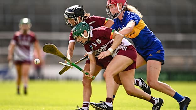 Galway players Aoife Donohue, behind, and Niamh Mallon in action against Emma Carey of Tipperary during their Glen Dimplex All-Ireland camogie senior semi-final. Photo by Ben McShane/Sportsfile