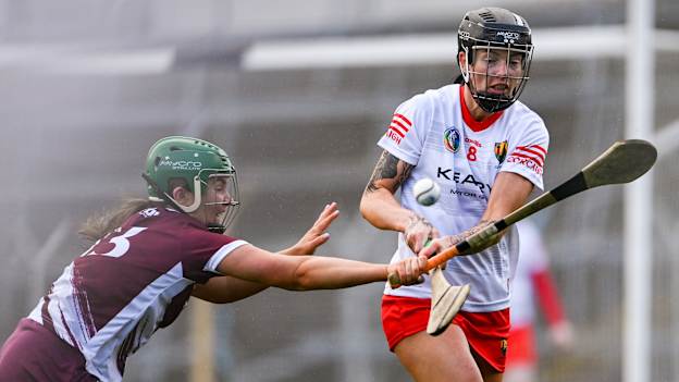 Ashling Thompson of Cork is tackled by Mairead Dillion of Galway during the Very National Camogie League Division 1A final. Photo by Tom Beary/Sportsfile