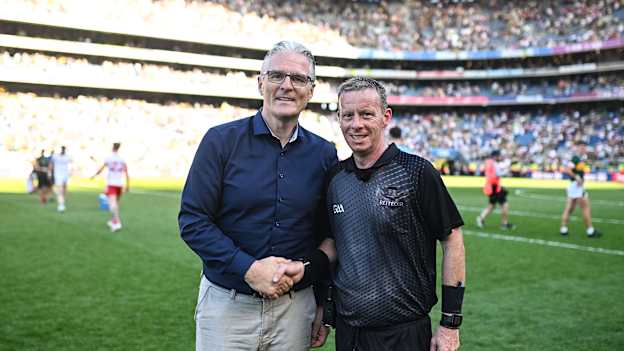 Referee Joe McQuillan shakes hands with Uachtarán Chumann Lúthchleas Gael Jarlath Burns after officiating his last intercounty match at the GAA Football All-Ireland Senior Championship semi-final match between Kerry and Tyrone at Croke Park in Dublin. Photo by Piaras Ó Mídheach/Sportsfile.