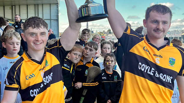 Four Roads Joint-Captains, Conor Coyle & Jack Donnelly lift the Mickey Cunniffe Cup after their team’s win over Oran in the Kepak Roscommon SHC Final.