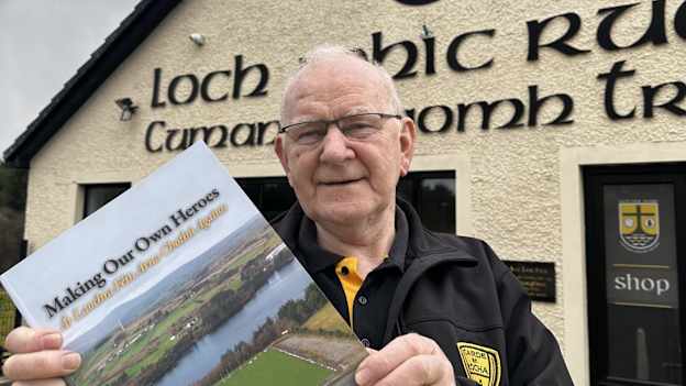 Lochmacrory GAA Club President, Sean Mullan, pictured with the club history he authored. 