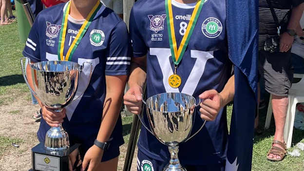 Captains of the victorious Young Melbourne U17 football teams at the 2025 Féile in Perth.