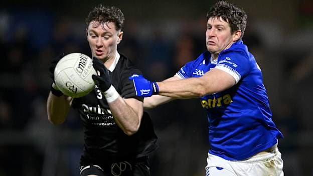 Ryan McEvoy of Kilcoo in action against Darren Hughes of Scotstown. The two teams will meet again in the AIB Ulster club SFC final. Photo by Ramsey Cardy/Sportsfile
