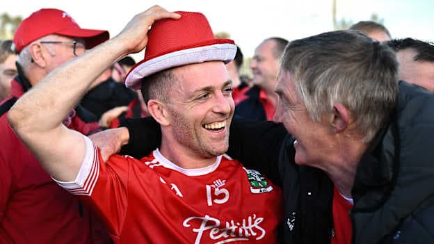 Niall Kelly of Athy celebrates with supporter Joe Robinson after the Kildare SFC final. Photo by Piaras Ó Mídheach/Sportsfile