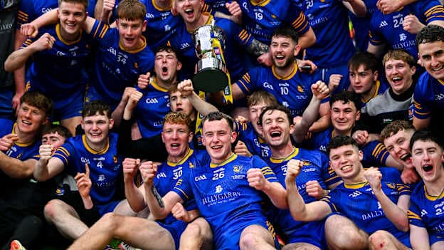 Ballymacelligott players celebrate with the cup after their side's victory in the AIB GAA Football Junior Club Championship final match between Ballymacelligott of Kerry and Clogher Eire Óg of Tyrone at Croke Park in Dublin. Photo by Piaras Ó Mídheach/Sportsfile.