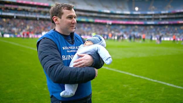 Niall Ó Ceallacháin celebrates with his son, Alfie, after managing Na Fianna to AIB All-Ireland SHC success at Croke Park. Photo by Ben McShane/Sportsfile