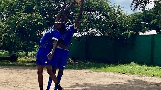Sables Shamrocks footballers reach for the sky in preparation for the 2026 GAA World Games. 