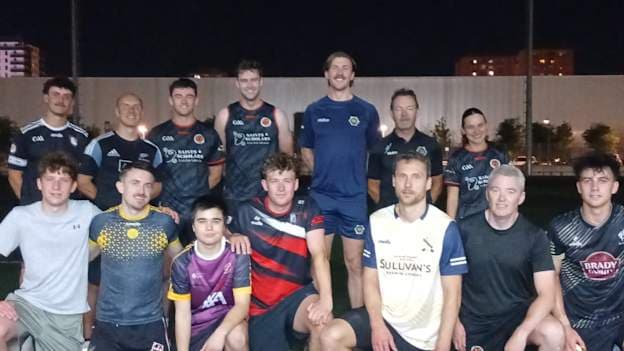 Anton Tohill pictured with members of Valencia GAA club. 
