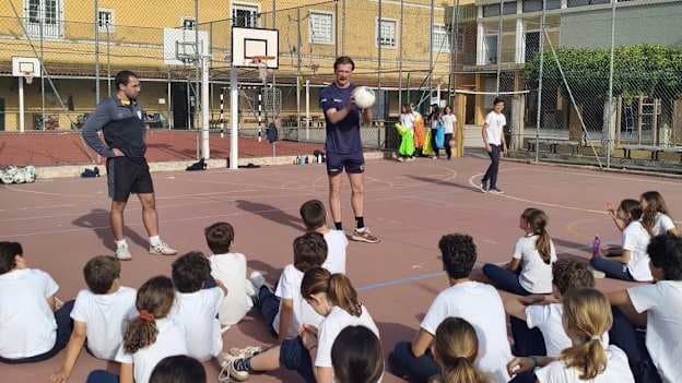 Anton Tohill pictured coaching school-children in Lisbon. 