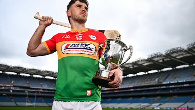 Carlow hurler Chris Nolan with the Joe McDonagh Cup. Photo by Ben McShane/Sportsfile