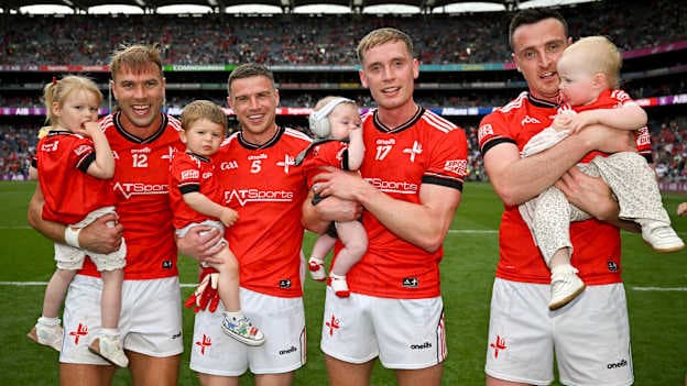 Louth players, from left, Conor Grimes, Conal McKeever, Ciaran Byrne, and Tommy Durnin, celebrate with their young children after their side's All-Ireland SFC quarter-final win over Monaghan at Croke Park in Dublin. Photo by Sam Barnes/Sportsfile