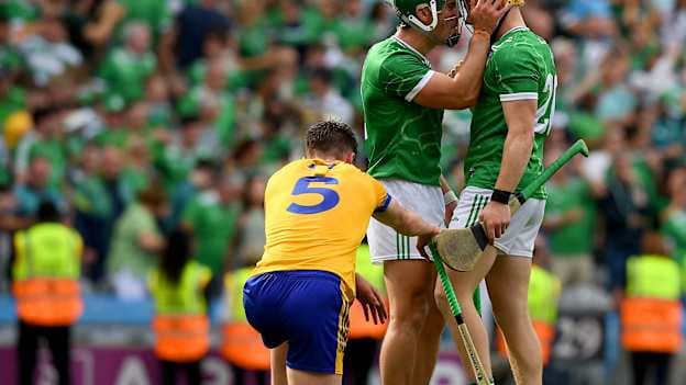 Limerick players, from left, Seán Finn and Fintan Fitzgerald celebrate infront of Diarmuid Ryan of Clare after the GAA Hurling All-Ireland Senior Championship semi-final match between Clare and Limerick at Croke Park in Dublin. Photo by John Sheridan/Sportsfile.