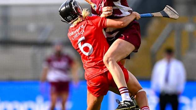 Shauna Healy of Galway is tackled by Laura Treacy of Cork during the Glen Dimplex All-Ireland Senior Camogie Championship final match between Cork and Galway at Croke Park in Dublin. Photo by Ramsey Cardy/Sportsfile.