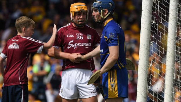 Galway's Davey Glennon shakes hands with Clare's Donal Tuohy after today's All-Ireland SHC semi-final replay. 