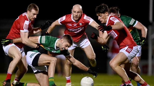 Adrian Spillane of Kerry in action against Mattie Taylor, left, and Colm O’Callaghan of Cork, right, during the McGrath Cup Group A match between Cork and Kerry at Páirc Ui Rinn in Cork. 