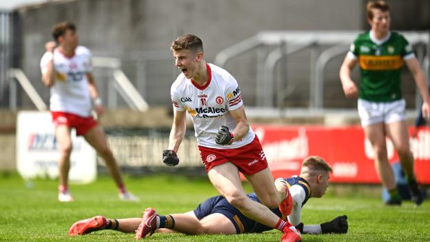 Ciarán Bogue of Tyrone celebrates after scoring his side's first goal as Kerry goalkeeper Devon Burns looks on during the EirGrid GAA Football All-Ireland U20 Championship Semi-Final match between Kerry and Tyrone at MW Hire O'Moore Park in Portlaoise, Laois. 