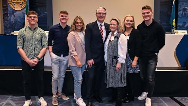 GAA president elect Jarlath Burns, centre, alongside his wife Suzanne, and his children, from left, Fionnan, Conall, Ellen, Megan and Jarly Óg during day one of the GAA Annual Congress 2023 at Croke Park in Dublin. 