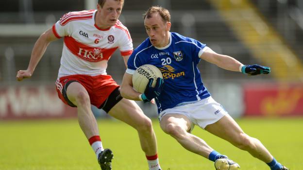 Brendan Rodgers, Derry, and Martin Reilly, Cavan, during a 2016 All Ireland SFC Qualifier.