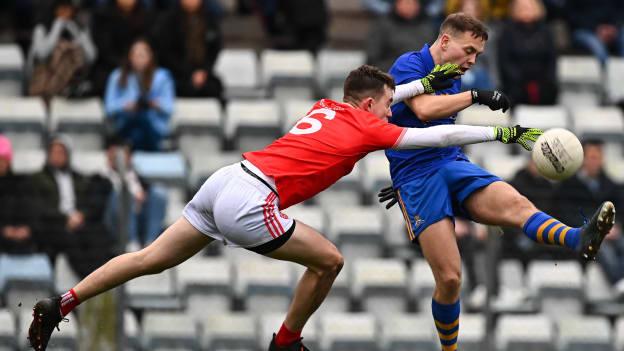 Steven Sherlock of St Finbarr's in action against Conall Ó'hAiniféin of Eire Óg Ennis during the AIB Munster GAA Football Senior Club Football Championship Semi-Final match between St. Finbarr's and Éire Óg Ennis at Pairc Ui Rinn in Cork.