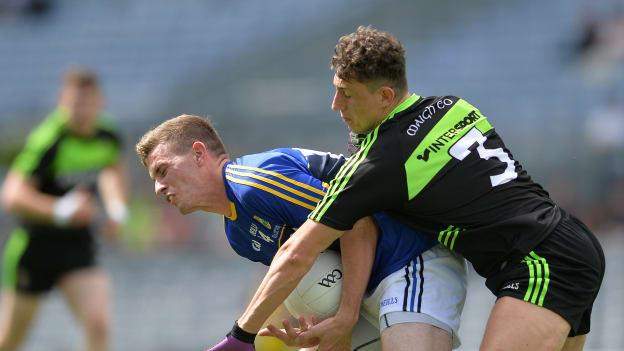 Kieran Hurley, Kerry, and Niall Freeman, Mayo, in action during the All Ireland JFC Final at Croke Park.