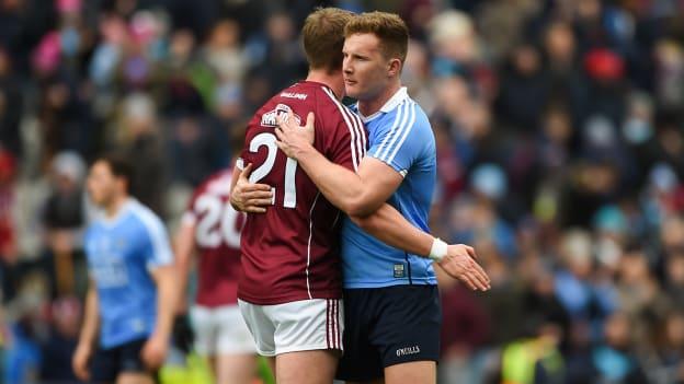 Gary O'Donnell and Ciarán Kilkenny embrace following the Allianz Football League Final.