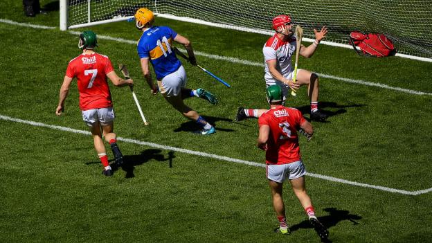 Cork goalkeeper Anthony Nash reacts as Séamus Callanan of Tipperary wheels away to celebrate his team's first goal during the Munster GAA Hurling Senior Championship Round 1 match at Pairc Ui Chaoimh in Cork. 