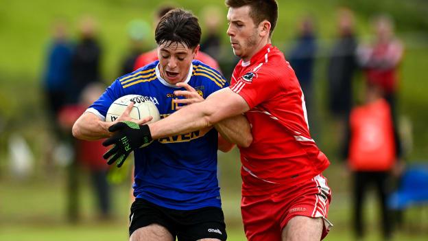 Andrew McClean, Kilcar, and Eoghan Bán Gallagher, Killybegs, collide during a Donegal Senior League game in July.