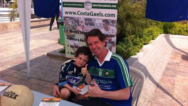 Justin Parks and his son Jake spreading the good work about Costa Gaels. 