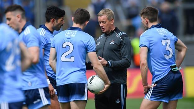Dublin selector Declan Darcy speaks with players, from left, Cian O'Sullivan, David Byrne, and Michael Fitzsimons before the Leinster GAA Football Senior Championship Semi-Final match between Dublin and Kildare at Croke Park in Dublin.