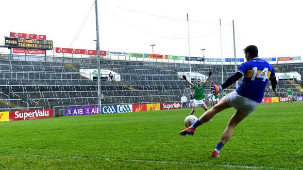 Conor Sweeney of Tipperary scores a point from a free, late in injury-time of the second half, to equalise and force extra-time in the Munster GAA Football Senior Championship Semi-Final match between Limerick and Tipperary at LIT Gaelic Grounds in Limerick. 
