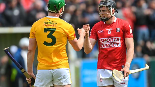 Darragh Fitzgibbon, Cork, and Gerard Walsh, Antrim, after the GAA Hurling All-Ireland Senior Championship Preliminary Quarter-Final match.