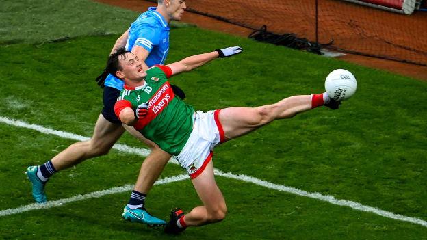 Diarmuid O'Connor of Mayo keeps the ball in play in the build up to a Mayo point during the GAA Football All-Ireland Senior Championship semi-final match between Dublin and Mayo at Croke Park in Dublin. 