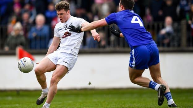 Jimmy Hyland of Kildare scores a point under pressure from Ryan Wylie of Monaghan during the Allianz Football League Division 1 match between Kildare and Monaghan at St Conleth's Park in Newbridge, Kildare. 