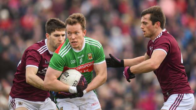 Donal Vaughan, Mayo, surrounded by Galway's Michael Boyle and Liam Silke at Tuam Stadium.