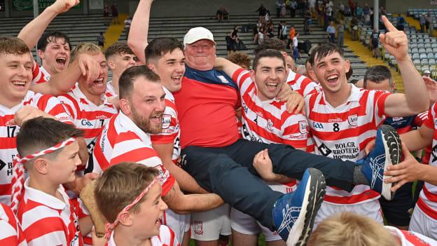 Pat Bennett celebrates with Ferns St Aidan's players at Chadwicks Wexford Park in August.