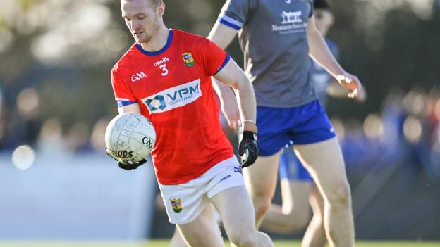 Donal McKenny, Ardee St Mary's, and Evan Whelan, Naomh Mairtin, in Louth SFC action at Dowdallshill. Photo by Stephen Marken/Sportsfile