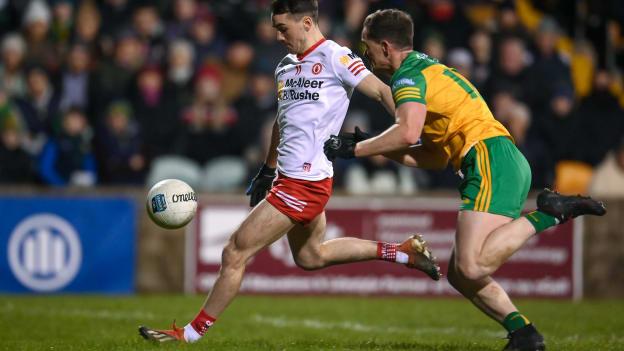 Darragh Canavan, Tyrone, and Ciaran Thompson, Donegal, in Allianz Football League action.