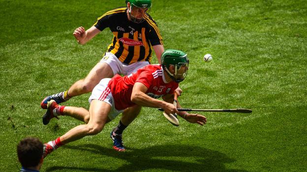 Alan Caodgan, Cork, and Joey Holden, Kilkenny, during the All Ireland SHC Quarter-Final at Croke Park.