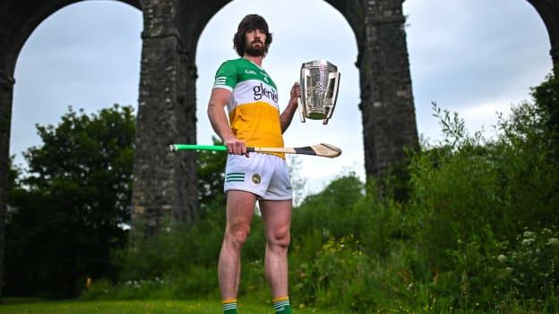 Offaly's Ben Conneely with the Liam MacCarthy Cup at the 2023 GAA Hurling All-Ireland Series national launch at Kilmacthomas Viaduct. Photo by Brendan Moran/Sportsfile