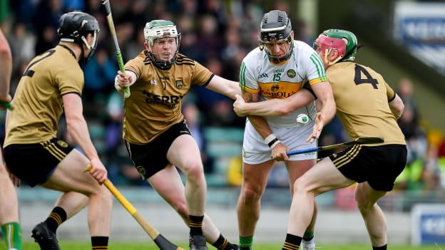 Shane Dooley of Offaly in action against James O'Connor, Daniel Collins and Seán Weir of Kerry during the Joe McDonagh Cup Round 5 match between Kerry and Offaly at Austin Stack Park, Tralee in Kerry.