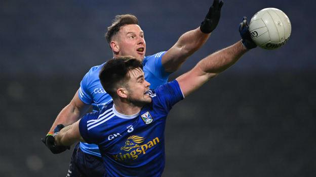 Thomas Galligan of Cavan is tackled by Philip McMahon of Dublin during the GAA Football All-Ireland Senior Championship Semi-Final match between Cavan and Dublin at Croke Park in Dublin. 