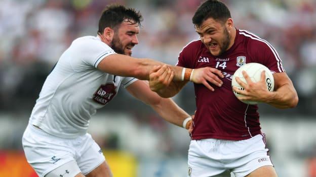 Damien Comer, Galway, and Fergal Conway, Kildare, during the opening period at St Conleth's Park, Newbridge.