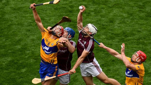 Peter Duggan, left, and John Conlon of Clare in action against Paul Killeen, left, and Daithi Burke of Galway during the GAA Hurling All-Ireland Senior Championship semi-final.